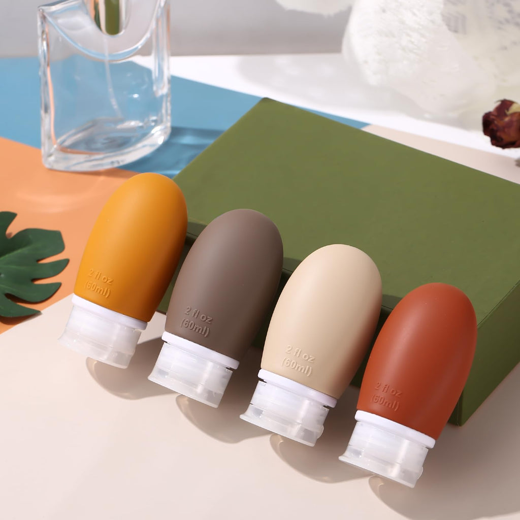 Silicone Travel Bottles,4 Pack Leak Proof Liquid Squeezable Refillable Portable Travel Accessories/Cosmetic Containers,BPA Free,Travel Size Bottles for Toiletries Shampoo Conditioner Lotion